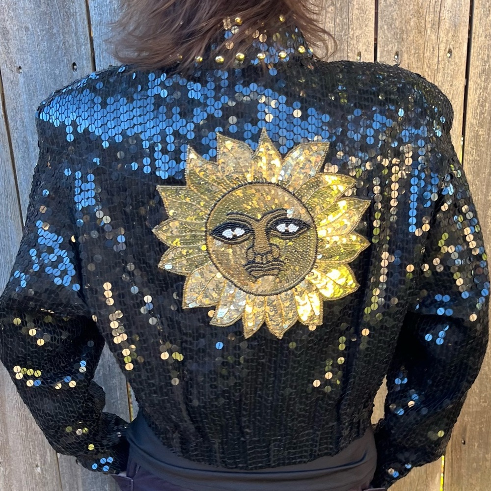 Black sequin jacket with beaded sun face on back ladies